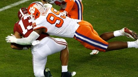 Clemson's Clelin Ferrell tackles Alabama QB Tua Tagovailoa