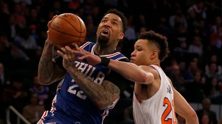Wilson Chandler #22 of the Philadelphia 76ers draws