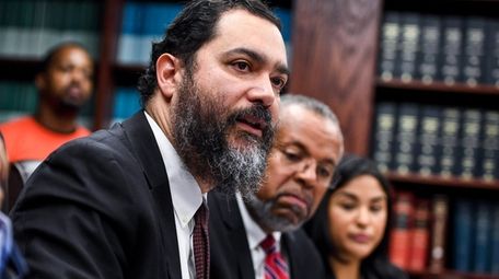 Hempstead schools Superintendent Shimon Waronker, left, with his
