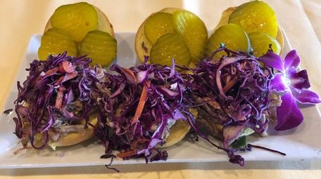 Pulled pork sliders are among the appetizers at