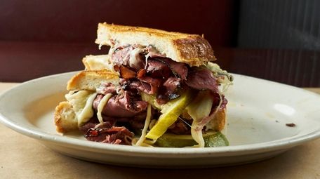 Pastrami grilled cheese with Swiss, mustard, pickles, at
