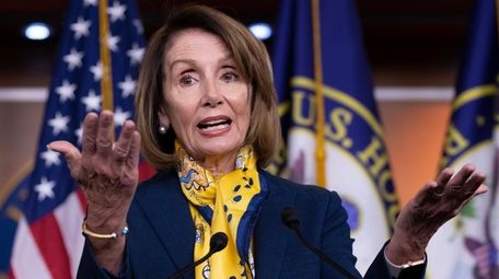 Speaker of the House Nancy Pelosi talks to
