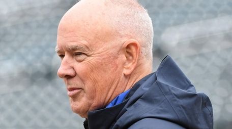 Then-Mets general manager Sandy Alderson looks on during