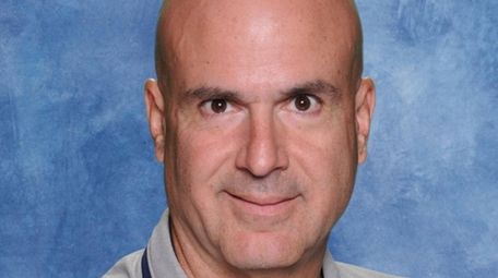 St. Dominic athletic director John Corso died