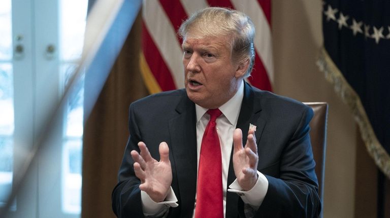 President Donald Trump speaks during a meeting about