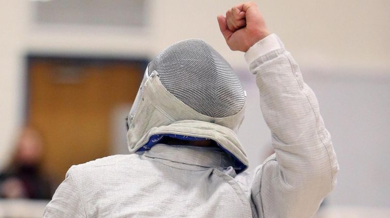 Jericho's Jonathan Sheng wins the boys sabre at