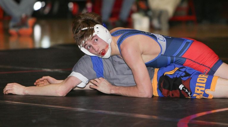 Bellport's Philip Throwbridge defeats Comsewogue's Martin Helmke in