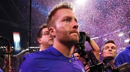Rams head coach Sean McVay walks off the