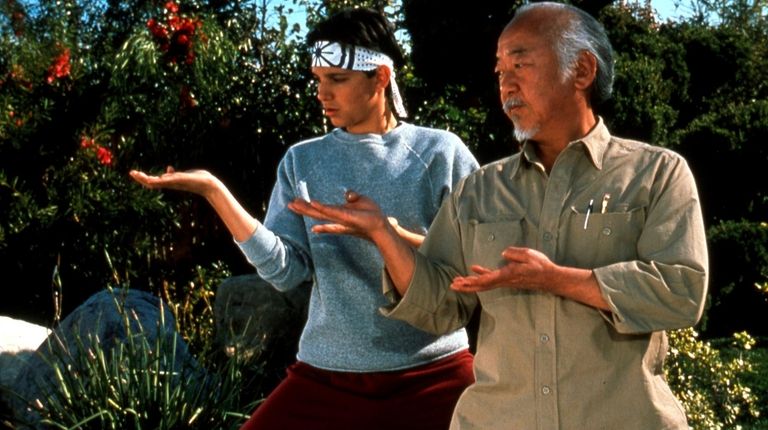 Ralph Macchio as Daniel and Pat Morita as