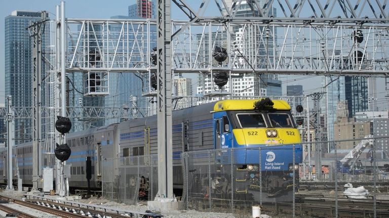 A Long Island Rail Road train passes under