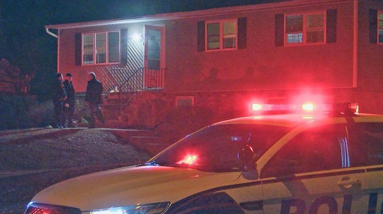 Police at the scene of the stabbing in