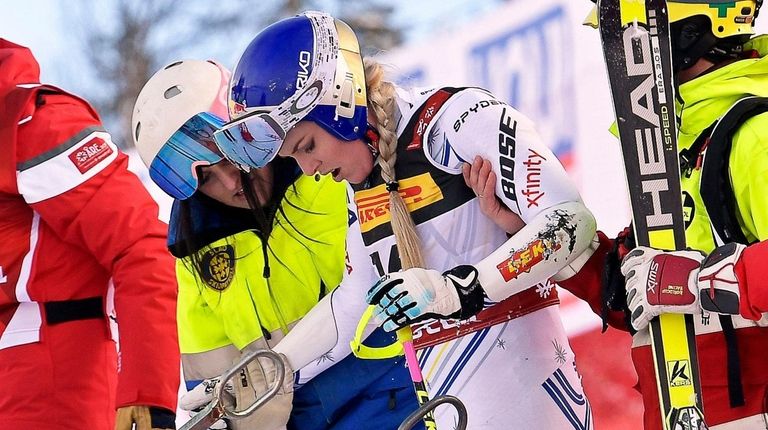 Lindsey Vonn reacts after crashing during the women's
