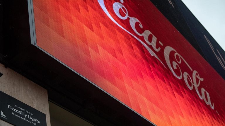 The soft drink giant reports quarterly earnings this