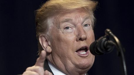 President Donald Trump attends the 2019 National Prayer