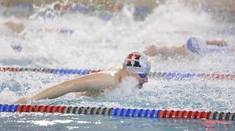 Half Hollow Hill's Corey Sherman swims the Butterfly