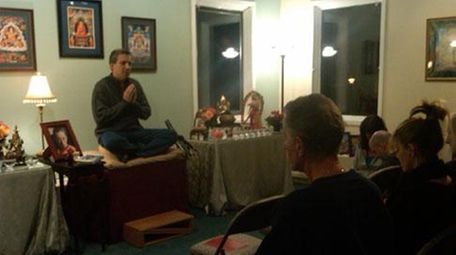 Michael Opisso teaches a meditation class at the