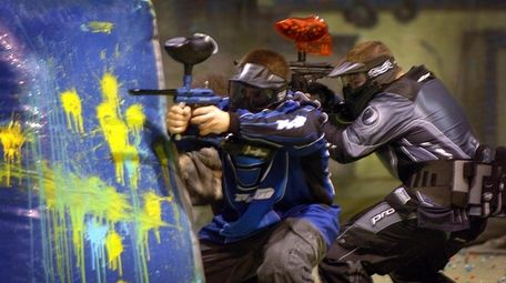 Players compete in a game of Paintball at