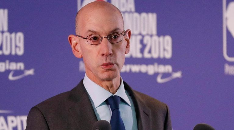NBA commissioner Adam Silver gestures during a news