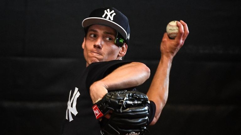 Yankees Pitcher Danny Farquhar throws a bullpen session