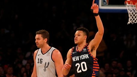 Kevin Knox #20 of the Knicks reacts after