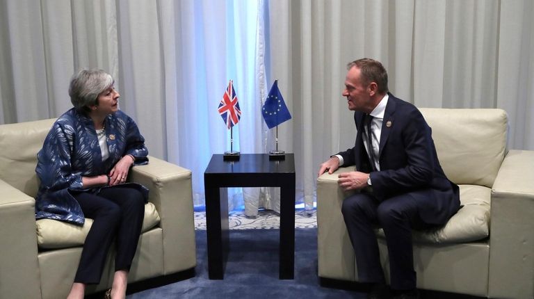 British Prime Minister Theresa May speaks with European