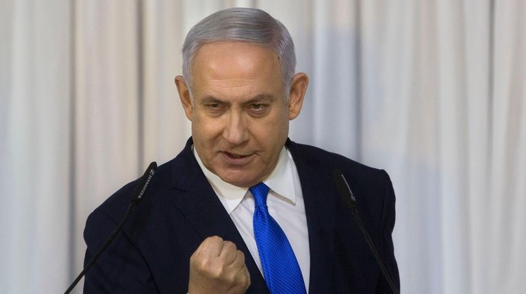 Israeli Prime Minister Benjamin Netanyahu gestures as he