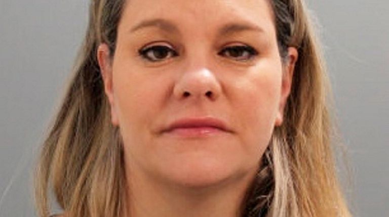 Jennifer A. Toscano is charged with grand larceny,