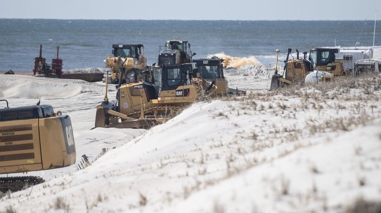 Sand replenishment underway at Gilgo Beach on Tuesday.