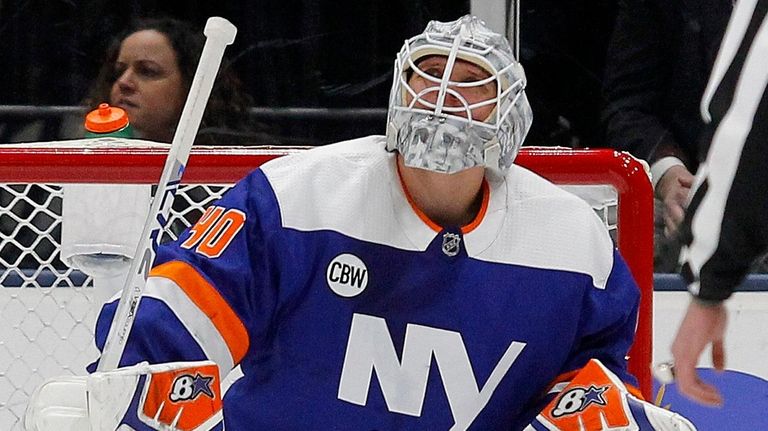 Robin Lehner of the Islanders looks on after
