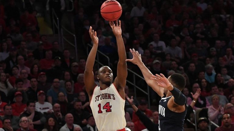St. John's guard Mustapha Heron shoots for a