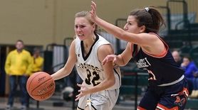 Brianna Derham #32 of Wantagh, left, dribbles as