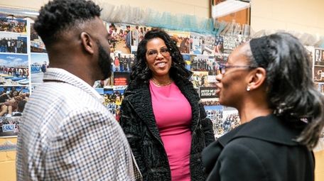 Ilyasah Shabazz, center, daughter of famed civil rights