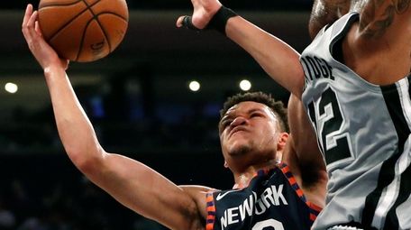 Knicks forward Kevin Knox looks for a shot