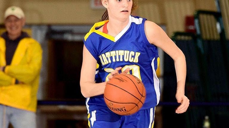 Mackenzie Hoeg #20 of Mattituck handles the ball