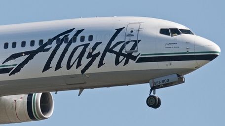 An Alaska Airlines Boeing 737 single-aisle narrow-body jet
