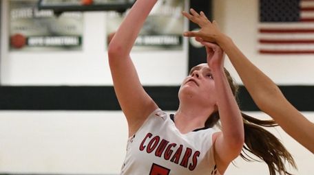 St. John the Baptist's Jen Gaffney shoots the