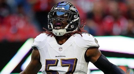 C.J. Mosley reacts after a defensive stop against