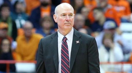 Northeastern head coach Bill Coen looks on against
