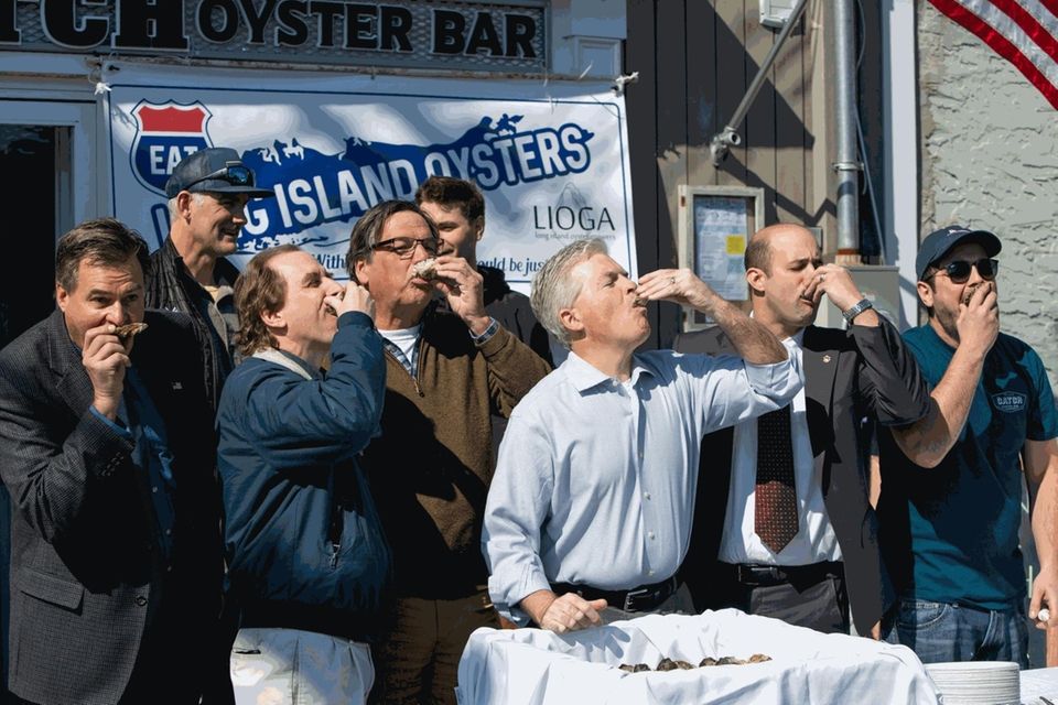 Surrounded by local elected officials and members of