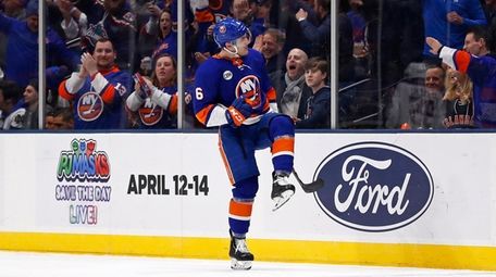 Islanders defenseman Ryan Pulock celebrates scoring a goal