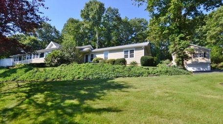 This Fort Salonga home is listed for $875,000.