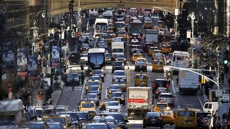 Traffic fills 42nd Street in midtown Manhattan on