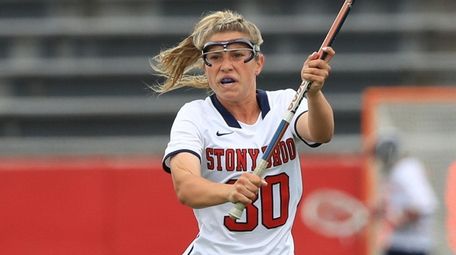 Stony Brook's Ally Kennedy passes the ball against
