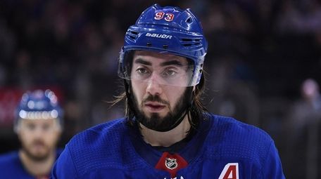 Rangers center Mika Zibanejad looks on against the