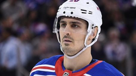 Rangers left wing Chris Kreider looks on against