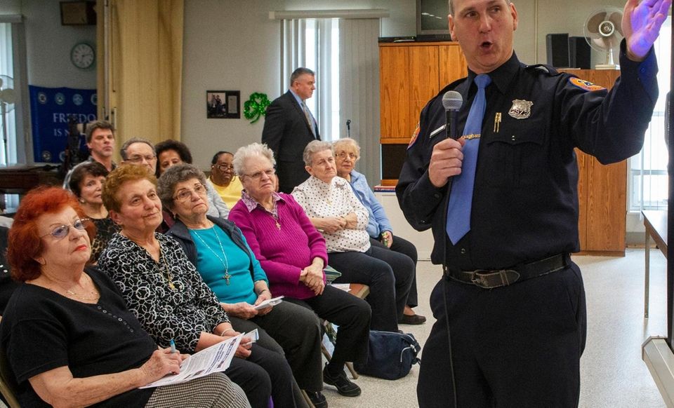 Nassau police Officer Dan Johannessen talks on Tuesday