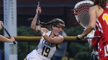 Katherine DeSimone of St. Anthony's leans in for