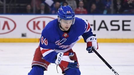 Rangers defenseman Neal Pionk skates against the Detroit