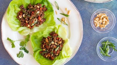 Hoisin-flavored ground beef with peanuts and vegetables fills