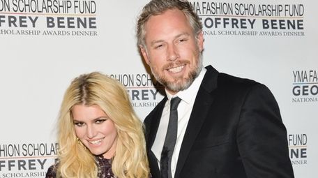 Jessica Simpson and husband Eric Johnson attend the